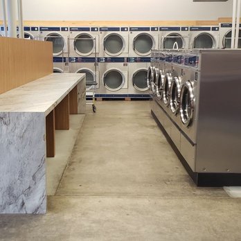 Henry's Laundromat - More clean folding areas with bigger washers to save money - Laundromat Near Me - Ashland, Oregon