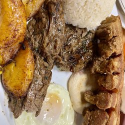 La Pequeña Colombia Bakery and Restaurant - Bandeja Tipica Frijoles, Arroz, Carne Asada, Chicharron, Maduros, Huevo, and Arepa