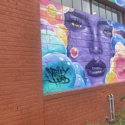 Purple Face Woman - View from left