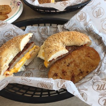 Manhattan Bagel - Sausage egg and cheese on a sesame seed bagel with a hash brown on the side. - Bagels Near Me - Wayne, New Jersey Manhattan Bagel - Sausage egg and cheese on a sesame seed bagel with a hash brown on the side. - Bagels Near Me - Wayne, New Jersey