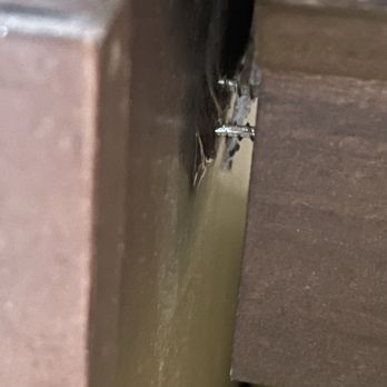 Hampton Inn & Suites Blythe - I think they need to fix the suitcase area. Only one screw is attaching this to the other piece of furniture. - Hotels Near Me - Blythe, California
