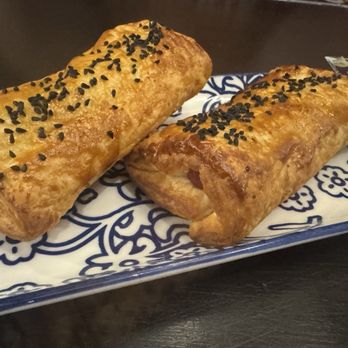 Notes Of Marrakesh - Sheep in a blanket- lamb sausage wrapped in phyllo dough topped with black sesame seeds - Juice Bars & Smoothies Near Me - Tulsa, Oklahoma Notes Of Marrakesh - Sheep in a blanket- lamb sausage wrapped in phyllo dough topped with black sesame seeds - Juice Bars & Smoothies Near Me - Tulsa, Oklahoma