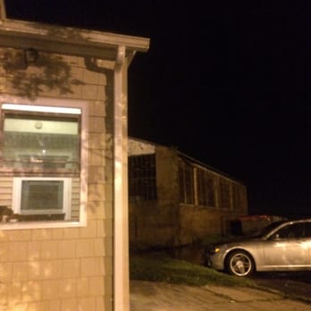 Windsock Inn - The back parking lot sitting just off Sikorsky airport. - Dive Bars Near Me - Stratford, Connecticut