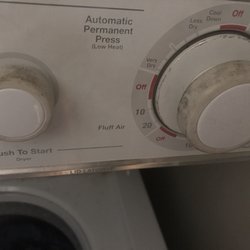 Hall Appliance - Grease covering dryer knobs left by technicians.