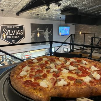 Sylvia’s Pizzeria - The Captain and upstairs seating. - Pizza Near Me - Pine Bluff, Arkansas Sylvia’s Pizzeria - The Captain and upstairs seating. - Pizza Near Me - Pine Bluff, Arkansas