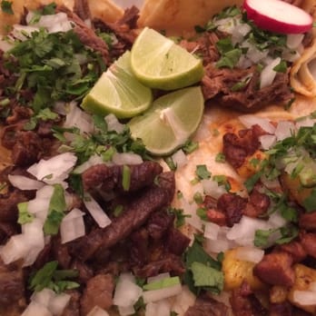 TacoBus - Clockwise from top left: Lamb, goat, pastor and asada. Goat was probably my favorite. - Mexican Near Me - Albuquerque, New Mexico