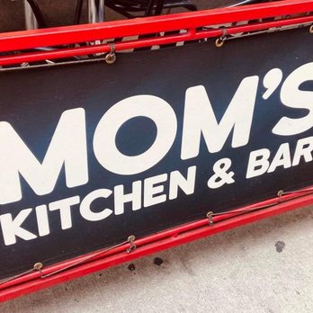 Mom's Kitchen & Bar - Outside patio sign - Bars Near Me - Astoria, New York Mom's Kitchen & Bar - Outside patio sign - Bars Near Me - Astoria, New York