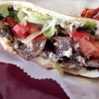 Falafel N Cafe - Lamb pita - half eaten so that you could see the lamb! - Mediterranean Near Me - Clearwater, Florida Falafel N Cafe - Lamb pita - half eaten so that you could see the lamb! - Mediterranean Near Me - Clearwater, Florida