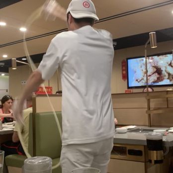 Haidilao Hotpot Flushing - Hand pulled noodle dance  Instagram @emthaw - Hot Pot Near Me - Flushing, New York