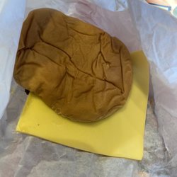 Texas Burger - They forgot cheese on kids burgers. Took it up there, this is what we got back.