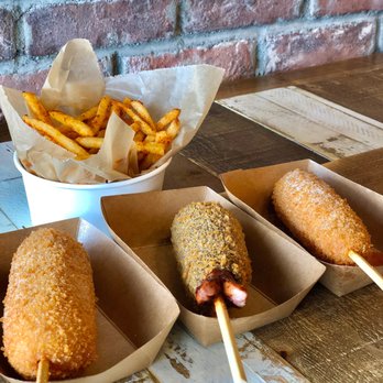 Mochinut - Spicy rice cake fries, volcano corn dog, squid ink and mozzarella corn dog, mozzarella corn dog - Hot Dogs Near Me - Cerritos, California Mochinut - Spicy rice cake fries, volcano corn dog, squid ink and mozzarella corn dog, mozzarella corn dog - Hot Dogs Near Me - Cerritos, California