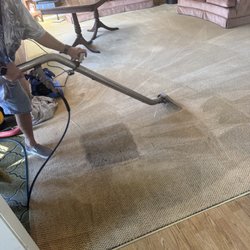 Tromp's Carpet Cleaning - Square patch of carpet, showing what the carpet look like in the beginning and the clean carpet surrounding it.