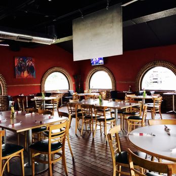 Pulqueria Midway - tables and chairs in a restaurant - Mexican Near Me - Chicago, Illinois Pulqueria Midway - tables and chairs in a restaurant - Mexican Near Me - Chicago, Illinois