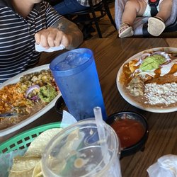 Bibiano’s Mexican Restaurant - Left: chicken friend steak topped with green chile. Right: Chilaquiles with eggs (over easy)