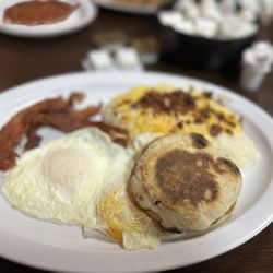 Morgan's Country Kitchen - Dirty Grits (with bacon Cheese ) English Muffin  , eggs over medium , bacon