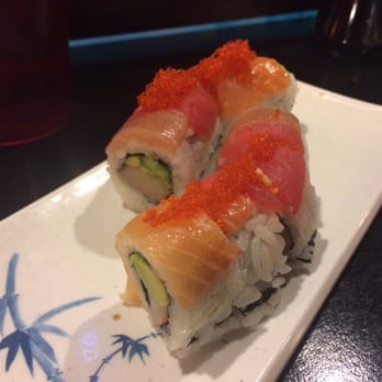 Pisces Sushi - Rainbow roll with imitation crab meat and extremely thin slices of fish - Sushi Bars Near Me - Reno, Nevada