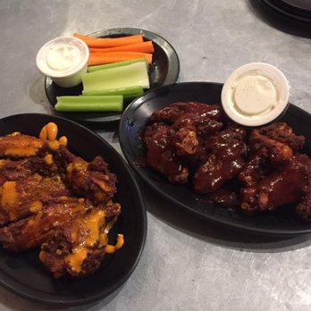 The Rail a Pizza Company - Crispy Louisiana hot and Spicy BBQ wings - Pizza Near Me - Rogers, Arkansas