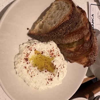 La Pecora Bianca UES - Whipped Ricotta truffle honey, country toast - Italian Near Me - New York, New York La Pecora Bianca UES - Whipped Ricotta truffle honey, country toast - Italian Near Me - New York, New York