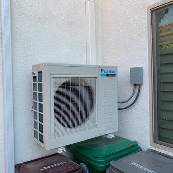 Speedy Ac - Outdoor install of mini split condenser above trash bins. - Heating & Air Conditioning/HVAC Near Me - La Quinta, California
