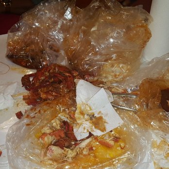 LA Fisherman - Snow crab legs, shrimp, lobster tail and crawfish. This is the aftermath...really no caption needed! - Seafood Near Me - Houston, Texas