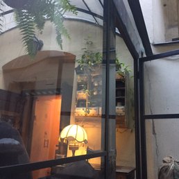 View of the greenhouse with eclectic decor