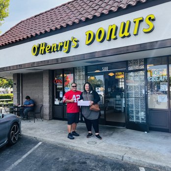 O'Henry's Donuts - two people standing in front of a restaurant - Bakeries Near Me - Morgan Hill, California O'Henry's Donuts - two people standing in front of a restaurant - Bakeries Near Me - Morgan Hill, California