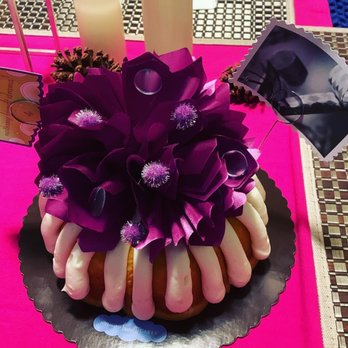 Nothing Bundt Cakes - a bundt cake decorated with purple flowers - Bakeries Near Me - Fort Myers, Florida Nothing Bundt Cakes - a bundt cake decorated with purple flowers - Bakeries Near Me - Fort Myers, Florida