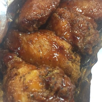 Gossip Shack 2 - Wings w Rumble in the Jungle (raspberry + mango) flavor - Chicken Wings Near Me - Pflugerville, Texas
