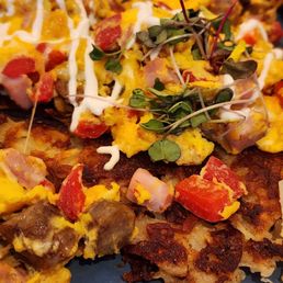 Kentucky scramble. Eggs, peppers, sausage cheese on top of hash browns Kentucky scramble. Eggs, peppers, sausage cheese on top of hash browns