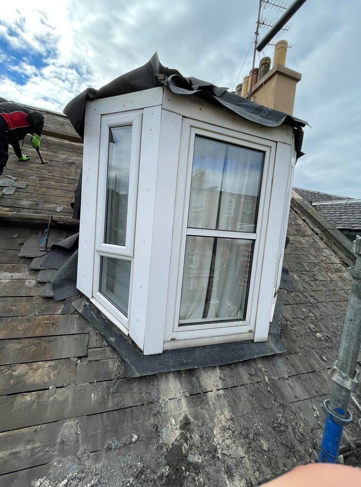 Slide of Quail Hill Roofing