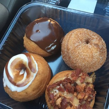 Da Vinci's Donuts - Clockwise: iced chocolate, cinnamon sugar, maple bacon, and cinnamon roll. - Donuts Near Me - Alpharetta, Georgia Da Vinci's Donuts - Clockwise: iced chocolate, cinnamon sugar, maple bacon, and cinnamon roll. - Donuts Near Me - Alpharetta, Georgia