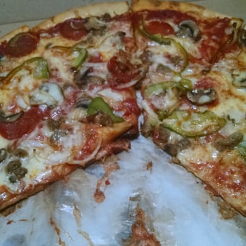 Luca's Pizza - a half eaten pizza in a box - Pizza Near Me - Telford, Pennsylvania Luca's Pizza - a half eaten pizza in a box - Pizza Near Me - Telford, Pennsylvania