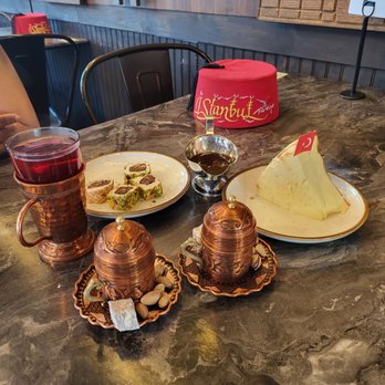Galata Sweets - a variety of food items on a table - Bakeries Near Me - Dearborn, Michigan