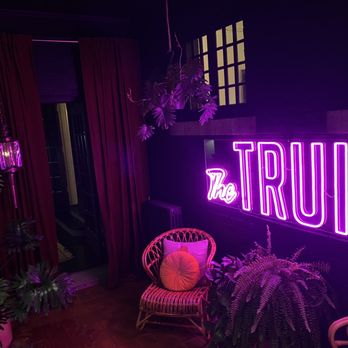 The Truitt - The back room is a built in porch filled with plants. - Hotels Near Me - Kansas City, Missouri
