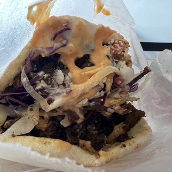 Tasty Kabab - What you see is the delicious flavors.  What you don't see is the heaping pile of meat served for this lunch pita sandwich.  Sooooo tasty! - Middle Eastern Near Me - Norfolk, Virginia