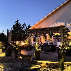 Oasis Outdoor Living - Backyard patio, retaining wall, paver patio and pergola