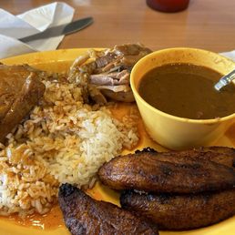 Brown stew chicken, white rice, beans and sweet plantains Brown stew chicken, white rice, beans and sweet plantains
