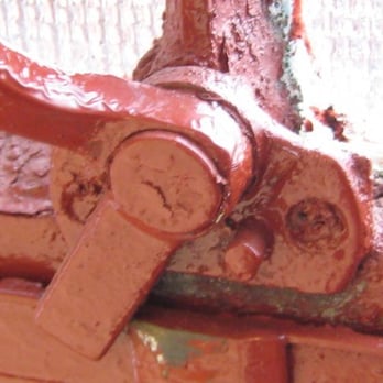 F X Matt Brewing - Macro of a window latch in the brewhouse - Breweries Near Me - Utica, New York F X Matt Brewing - Macro of a window latch in the brewhouse - Breweries Near Me - Utica, New York