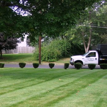 Muir Bros Landscaping and Snowplowing - a truck parked in the yard - Landscaping Near Me - Needham, Massachusetts Muir Bros Landscaping and Snowplowing - a truck parked in the yard - Landscaping Near Me - Needham, Massachusetts