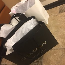 My 3 bags filled with clothes, clutch purse, and sexy heels!
