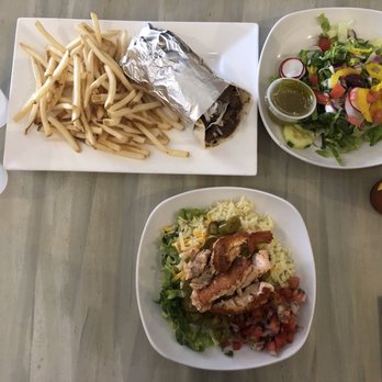 Sin & Grin - 1) Spit fire lamb and beef, 2) salmon bowl - Tacos Near Me - Gaithersburg, Maryland Sin & Grin - 1) Spit fire lamb and beef, 2) salmon bowl - Tacos Near Me - Gaithersburg, Maryland