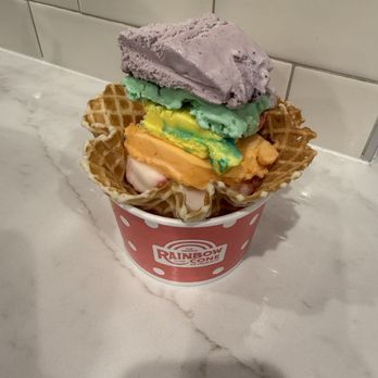 The Original Rainbow Cone - Slice creation in a waffle cup - Ice Cream & Frozen Yogurt Near Me - Cypress, California The Original Rainbow Cone - Slice creation in a waffle cup - Ice Cream & Frozen Yogurt Near Me - Cypress, California