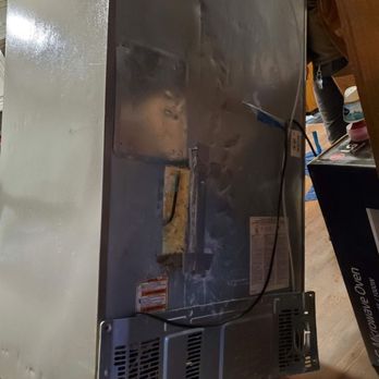 East End Appliance Service - The back of the fridge where ice formed on the out side after being unwrapped of the plastic it was delivered in. - Appliances & Repair Near Me East End Appliance Service - The back of the fridge where ice formed on the out side after being unwrapped of the plastic it was delivered in. - Appliances & Repair Near Me