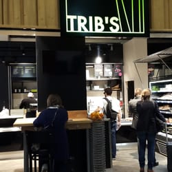 Trib's - A small Cafe. Airport not good. The people won't speak english. Tables dirty. Waitress without a smile.