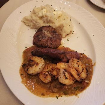 Eddie Merlot's - 4 oz Steak + Shrimp and andouille. Served with mashed potatoes - Steakhouses Near Me - Indianapolis, Indiana Eddie Merlot's - 4 oz Steak + Shrimp and andouille. Served with mashed potatoes - Steakhouses Near Me - Indianapolis, Indiana