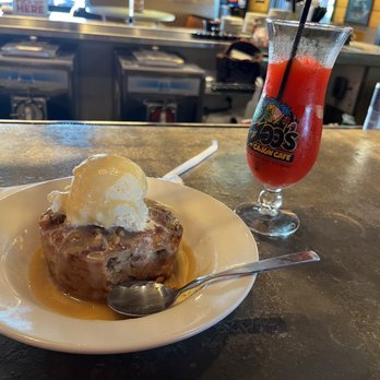 Razzoo's Cajun Cafe - Bread pudding with a scoop of ice cream and a hurricane - Cajun/Creole Near Me - College Station, Texas