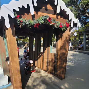 Kidspace Children's Museum - Riding through the gingerbread house - Children's Museums Near Me - Pasadena, California Kidspace Children's Museum - Riding through the gingerbread house - Children's Museums Near Me - Pasadena, California