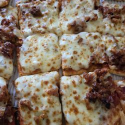 Casey's - Large, thin crust, all meat pizza.