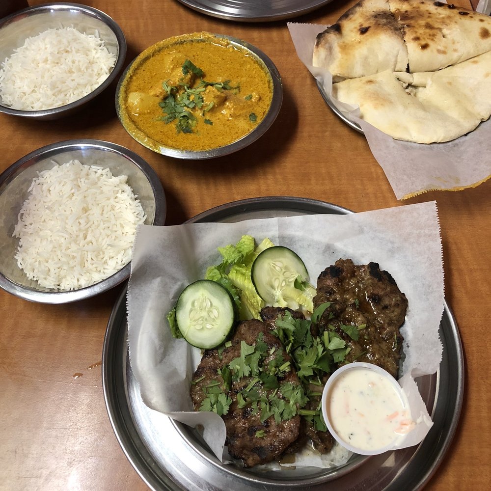 Curry Sultan - Lamb Kabobs for me and Vindaloo for my wife, with delicious Naan bread. Yum! - Indian Near Me - Humble, Texas Curry Sultan - Lamb Kabobs for me and Vindaloo for my wife, with delicious Naan bread. Yum! - Indian Near Me - Humble, Texas