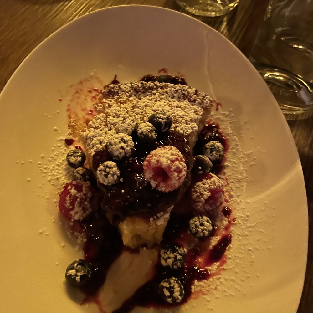 West Side Tavern - Olive oil cake with berry compote- so yummy - Gastropubs Near Me - Longmont, Colorado West Side Tavern - Olive oil cake with berry compote- so yummy - Gastropubs Near Me - Longmont, Colorado